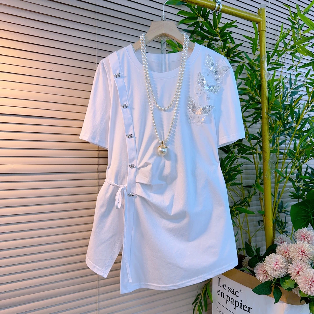 2590胖mm欧货时尚重工亮片立体蝴蝶不等式开衩款设计感泡泡袖衫