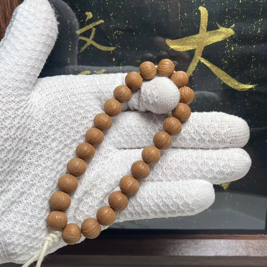 猴头核桃小凤羽10mm-12mm正圆同尺小手持