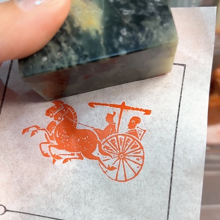 老挝石印石车马图