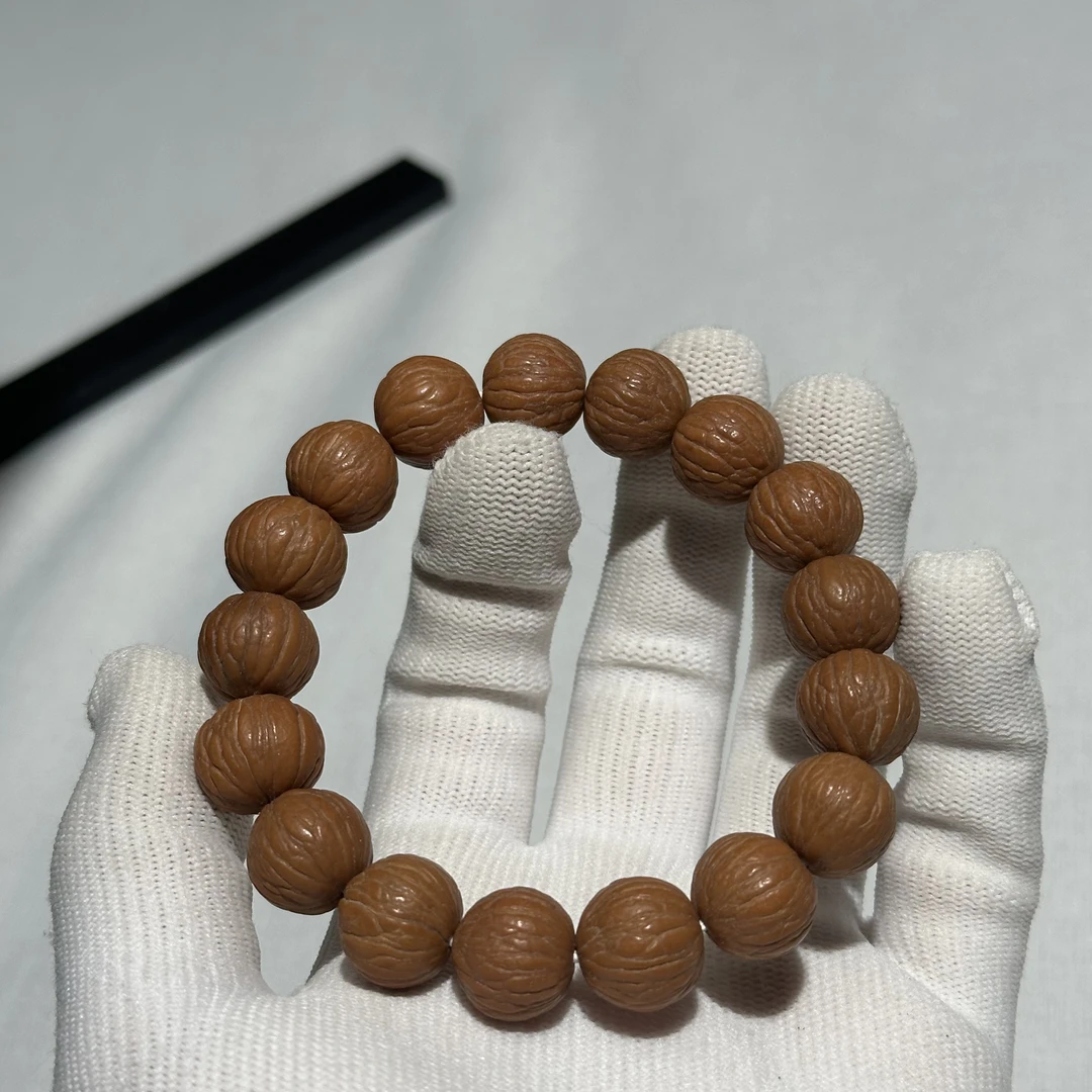 精选野生无修猴头凤羽土豪精品文玩核桃单圈佛珠