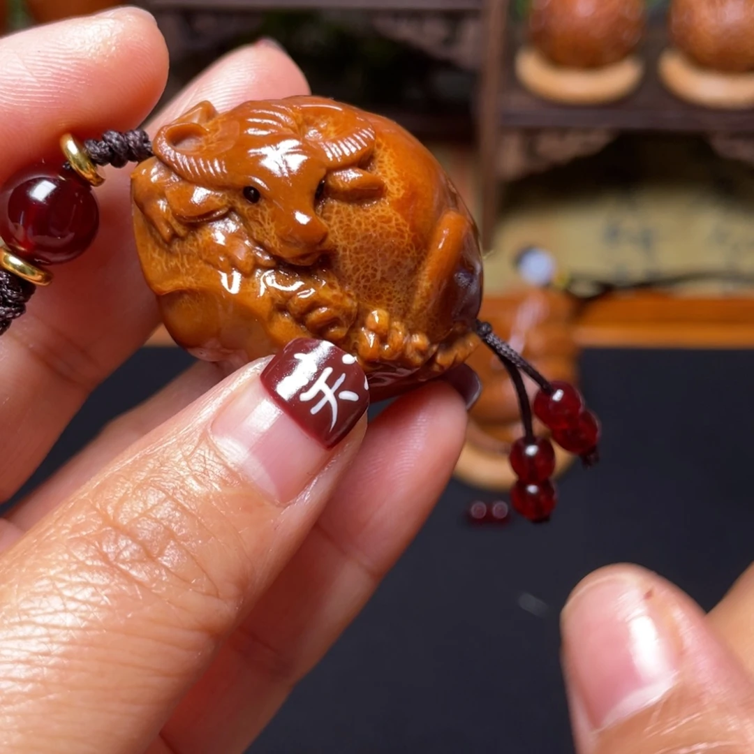 橄榄核吊坠牛掰穿配