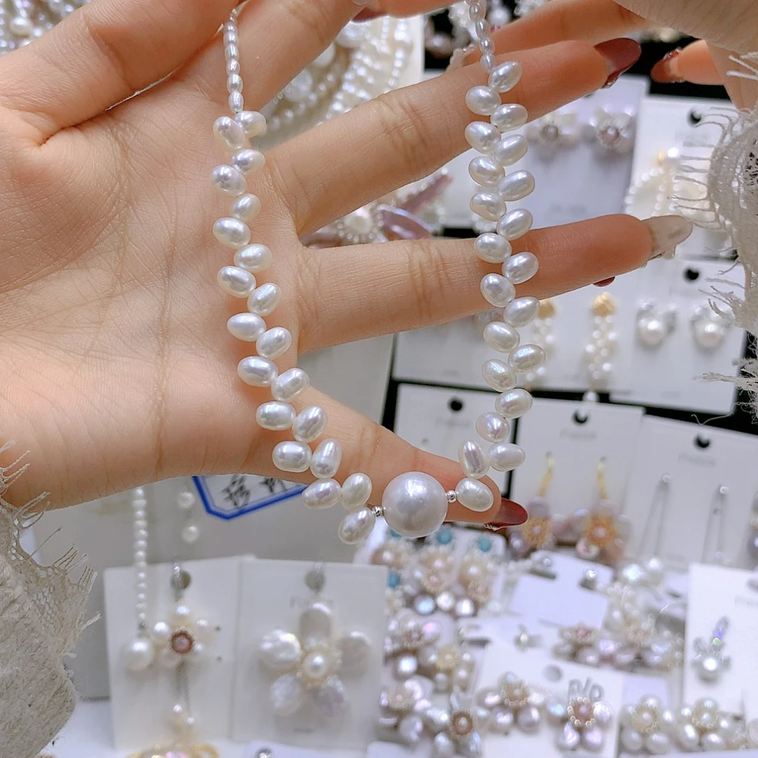 银S925镶嵌耳饰淡水珍珠《****&