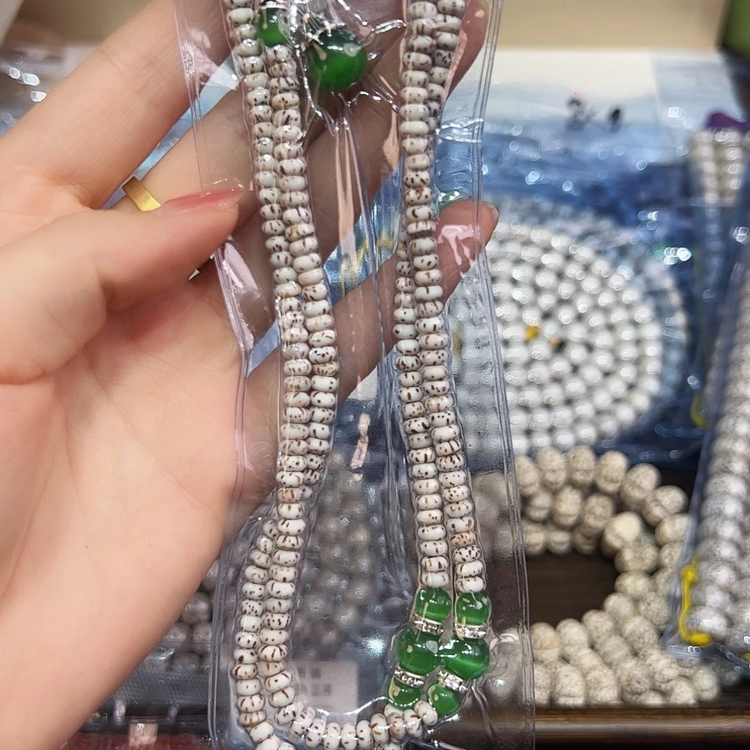 奎***哥星月菩提吊坠两红两绿