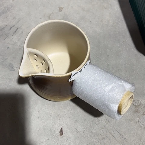 微瑕，明火，不能干烧，约400毫升嘴口变形有小缺，610