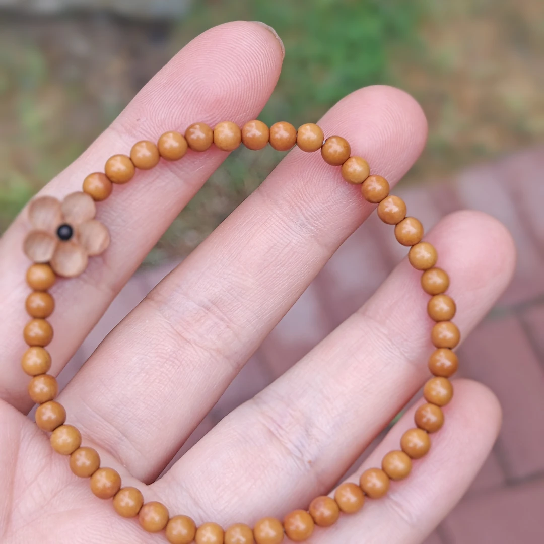 橄榄核小圆珠手串0.4配朱砂桃木