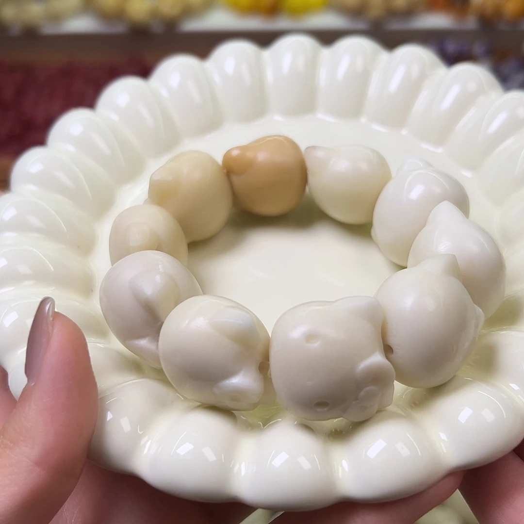 菩提根/象牙果手串瑕疵kt猫头手串一条