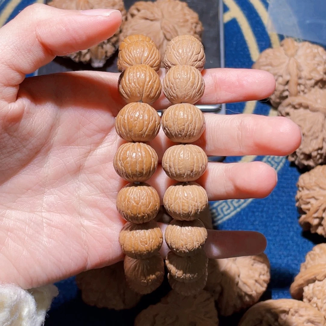 文玩核桃吊坠14mm原皮凤羽猴头