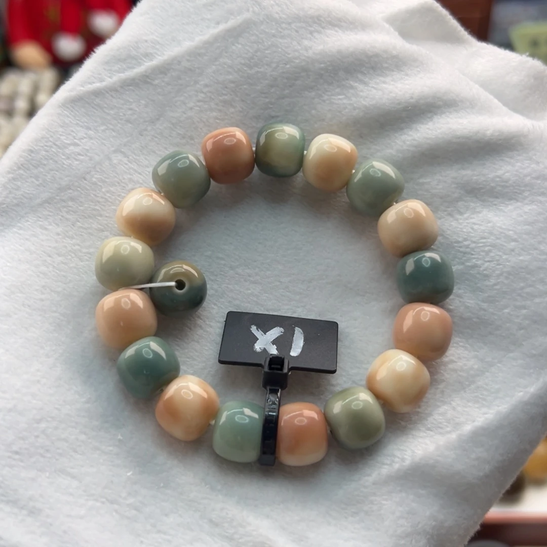 菩提根/象牙果手串卡13桶珠瑕疵1