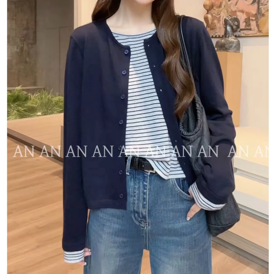 2025年秋季新款洋气时尚温柔风宽松圆领简约拼接条纹假两件针织衫