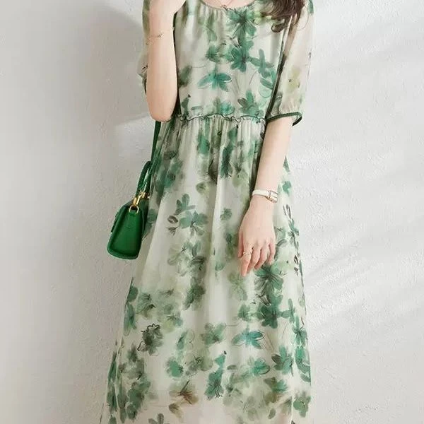 杭州重磅真丝连衣裙女短袖2025夏季新款绿色碎花桑蚕丝裙子年轻款