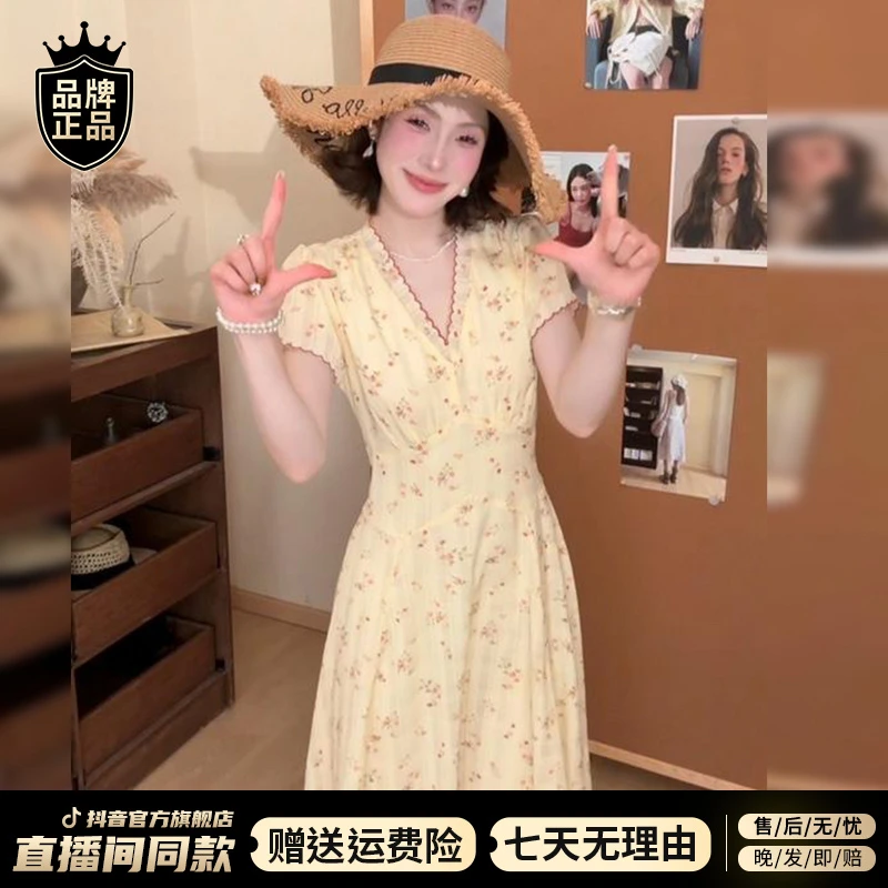 2025夏季新款黄色v领碎花连衣裙子女法式气质高级感收腰显瘦长裙