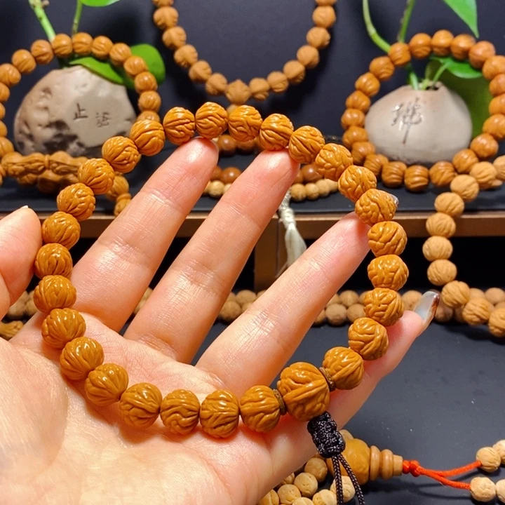 桃核手串野生凤羽手持