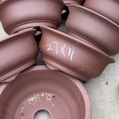 100-7。 27.11。