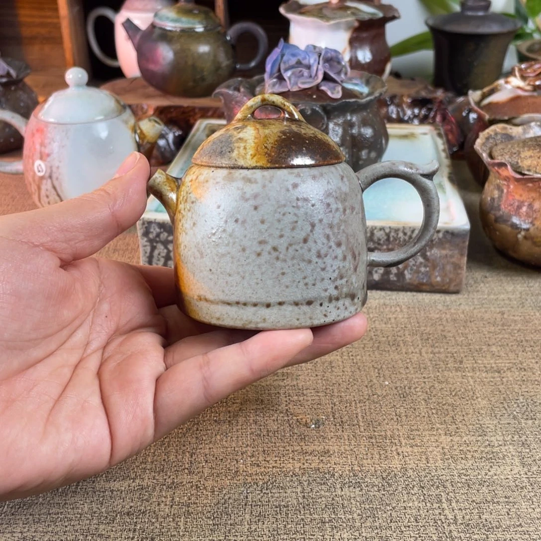 59秦权。   容量130。