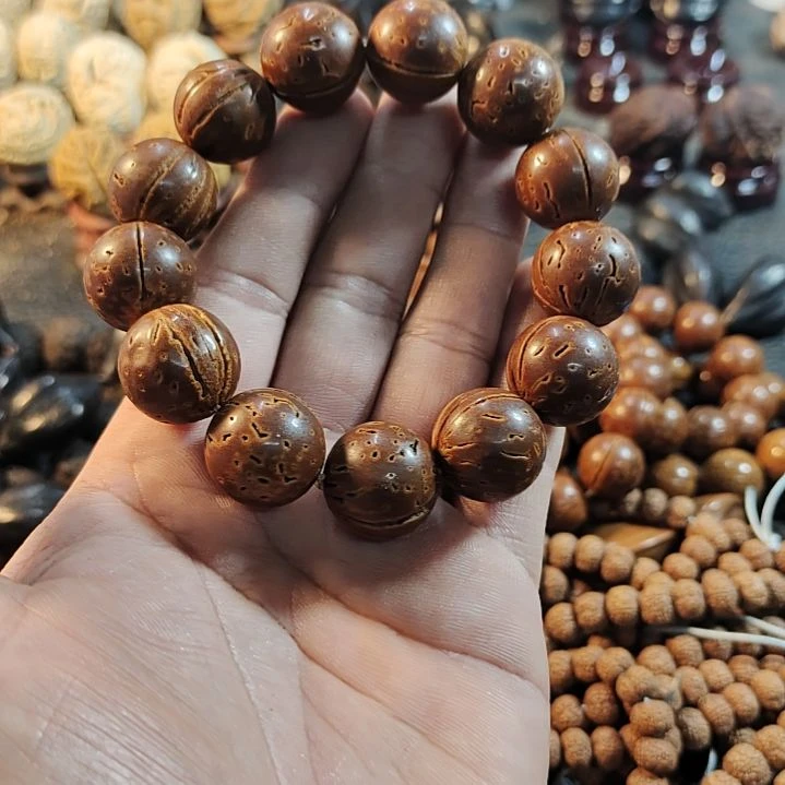 文玩核桃吊坠桃核光珠手串