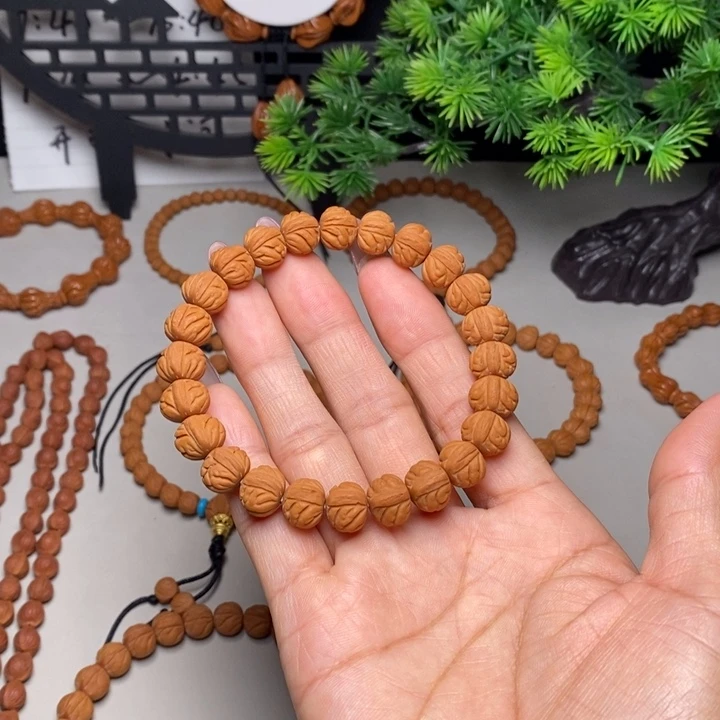 桃核手串凤羽手串