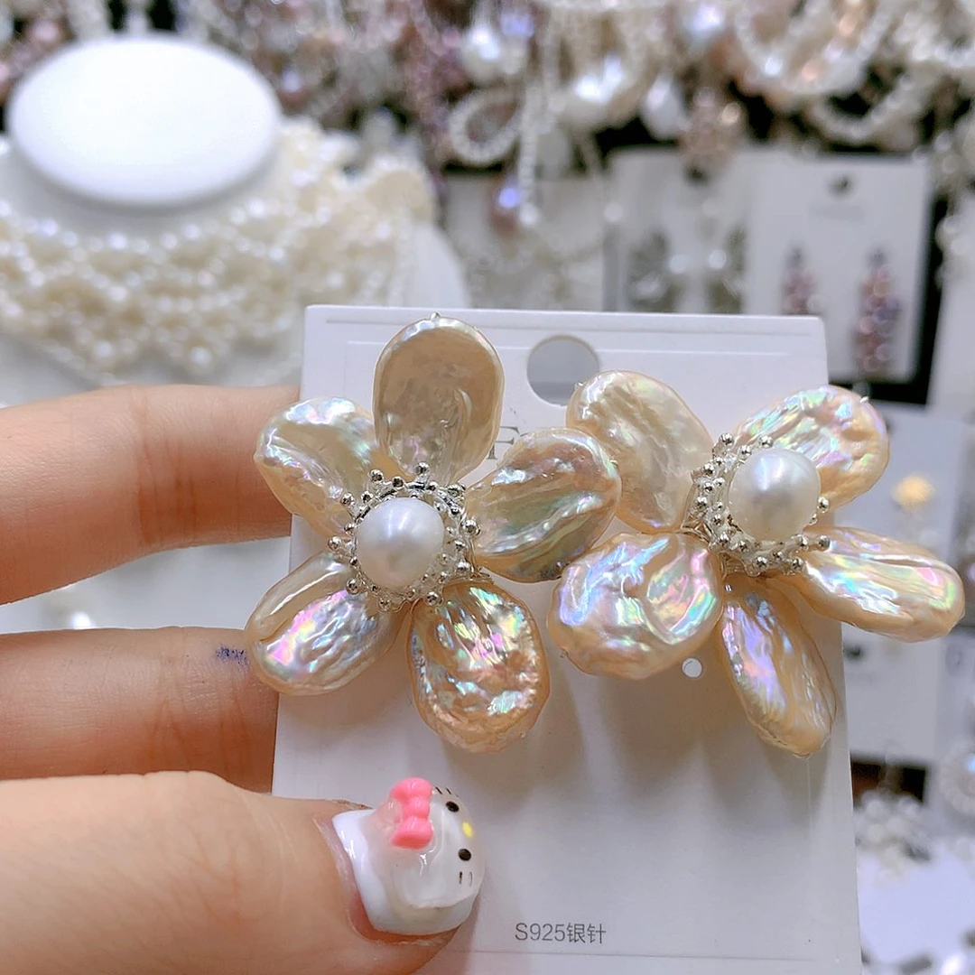 银S925镶嵌耳饰淡水珍珠凌**起