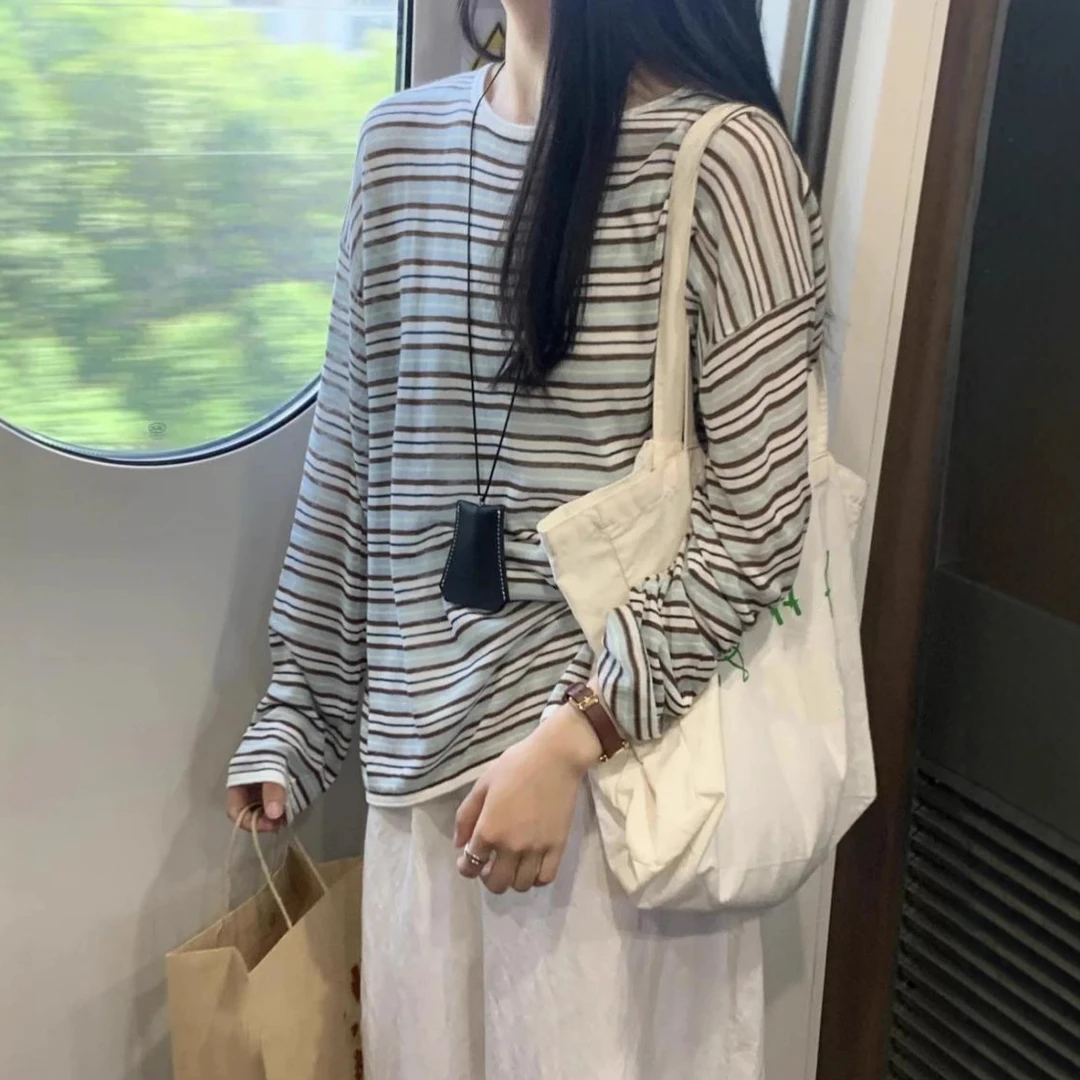 2025早秋新款韩系薄款撞色条纹针织衫上衣女宽松休闲毛衣防晒罩衫