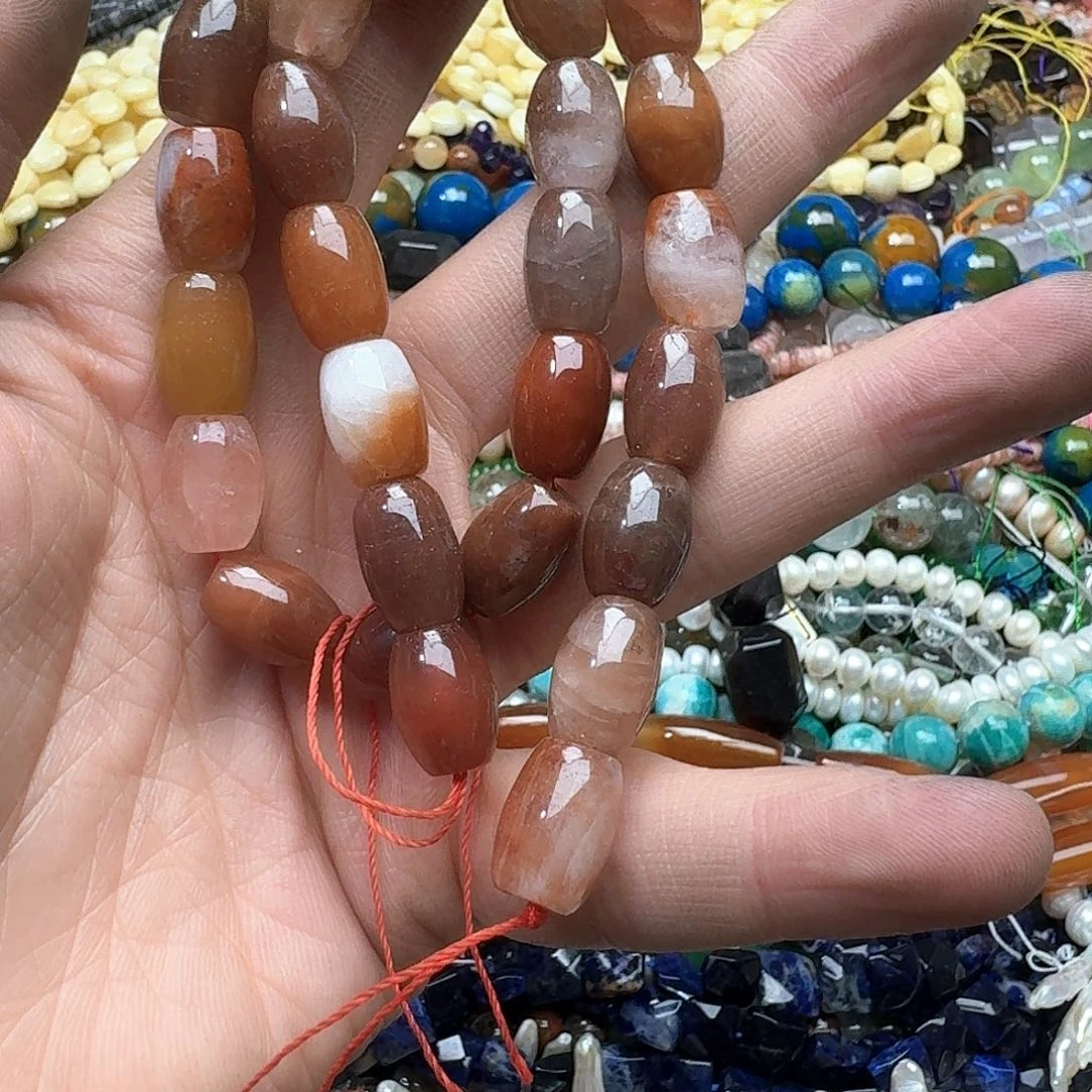 洛***洛玛瑙/玉髓未镶嵌珠宝半成品一条红兔毛桶珠