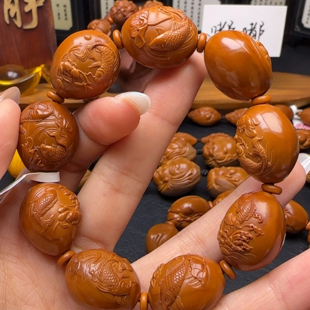 橄榄核手串/手链荷花鱼