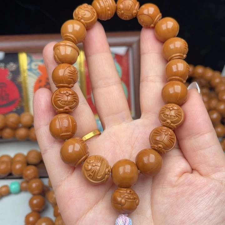 㞮****猴头核桃手串微瑕机器猫