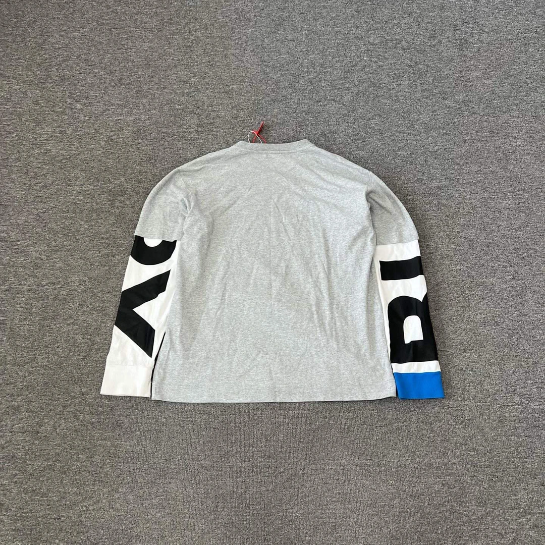 99新 BURBERRY/博柏利 假两件字母拼接长袖T恤 m码