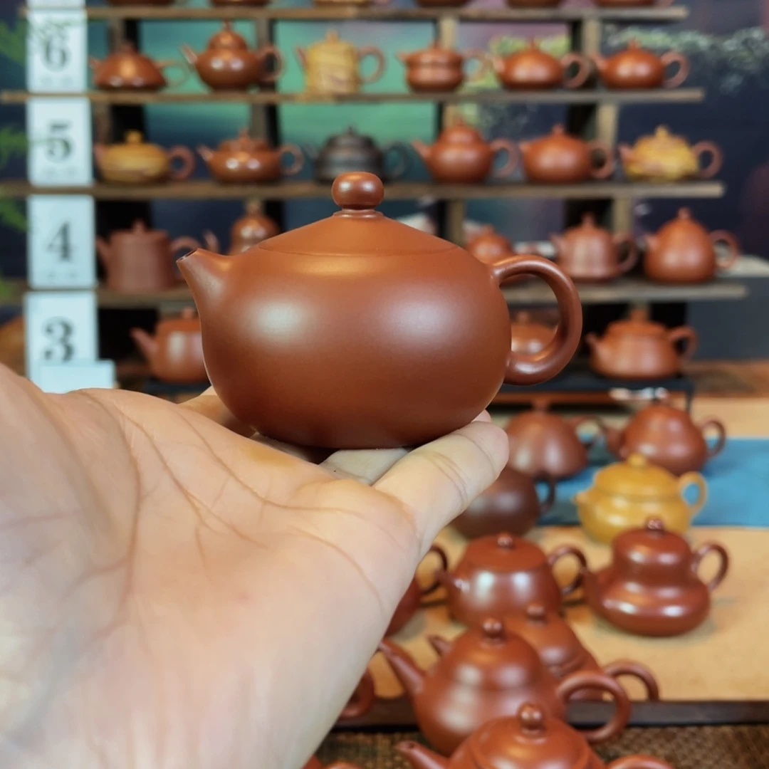 茶壶紫砂利****轮潮州手工手拉朱泥西施壶