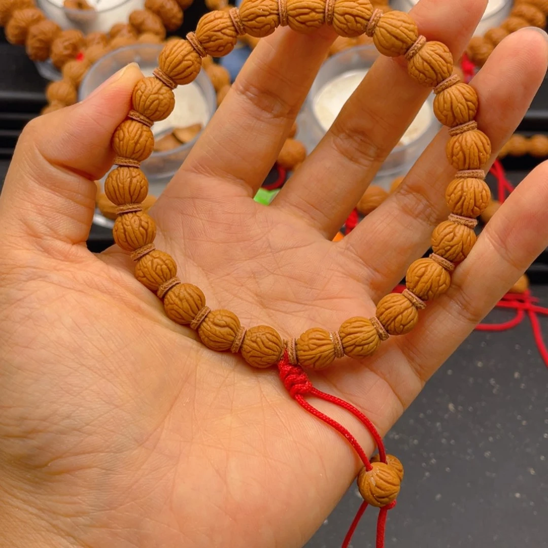 蒸***祝桃核吊坠见健健康康平平安安2