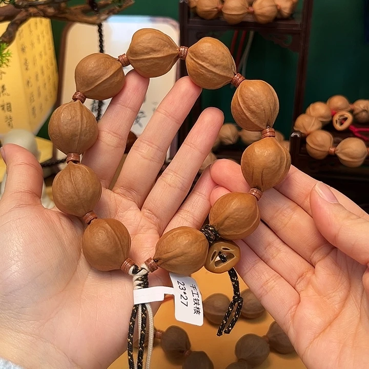 拒***聊橄榄核吊坠2327梅林铁核