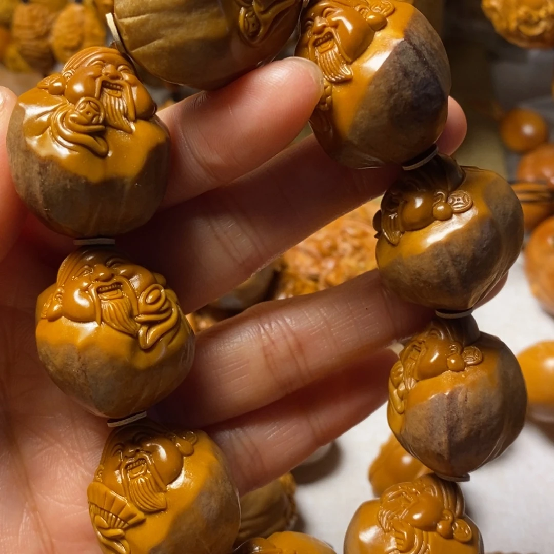 用***9手串/手链橄榄核精品包衣大财神