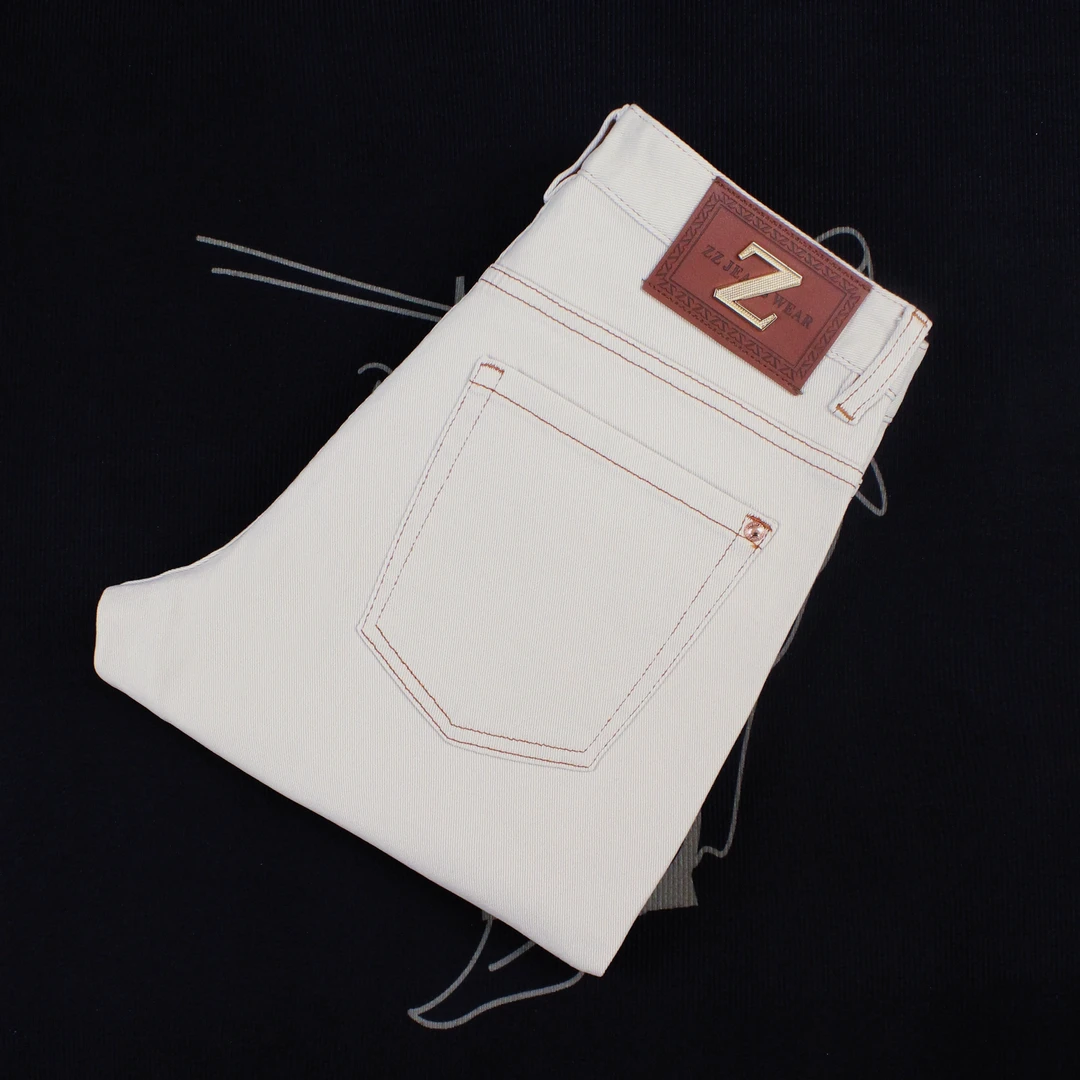 牛仔裤男2025新款修身小直脚弹力香槟杏色长裤春夏高奢欧货韩版