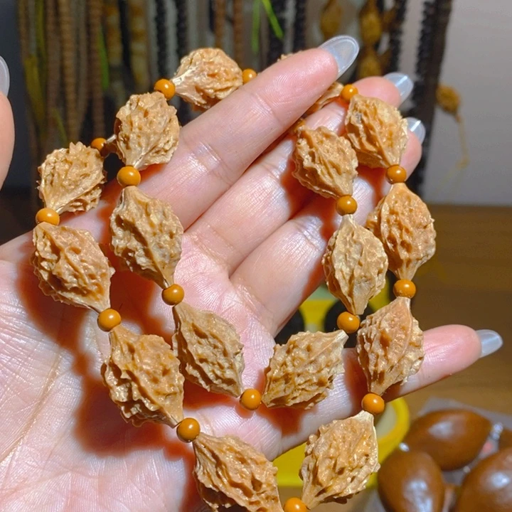 野生麒麟眼橄榄核手持18颗