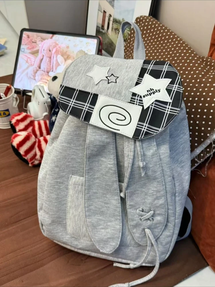 高颜值兔子耳朵翻盖束口双肩包出游通勤小书包INS涂鸦旅行包背包