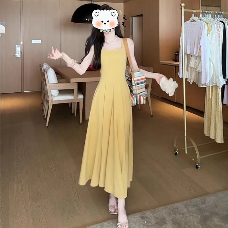 法式茶歇方领吊带连衣裙夏季a字无袖背心裙复古收腰显瘦黄色长裙