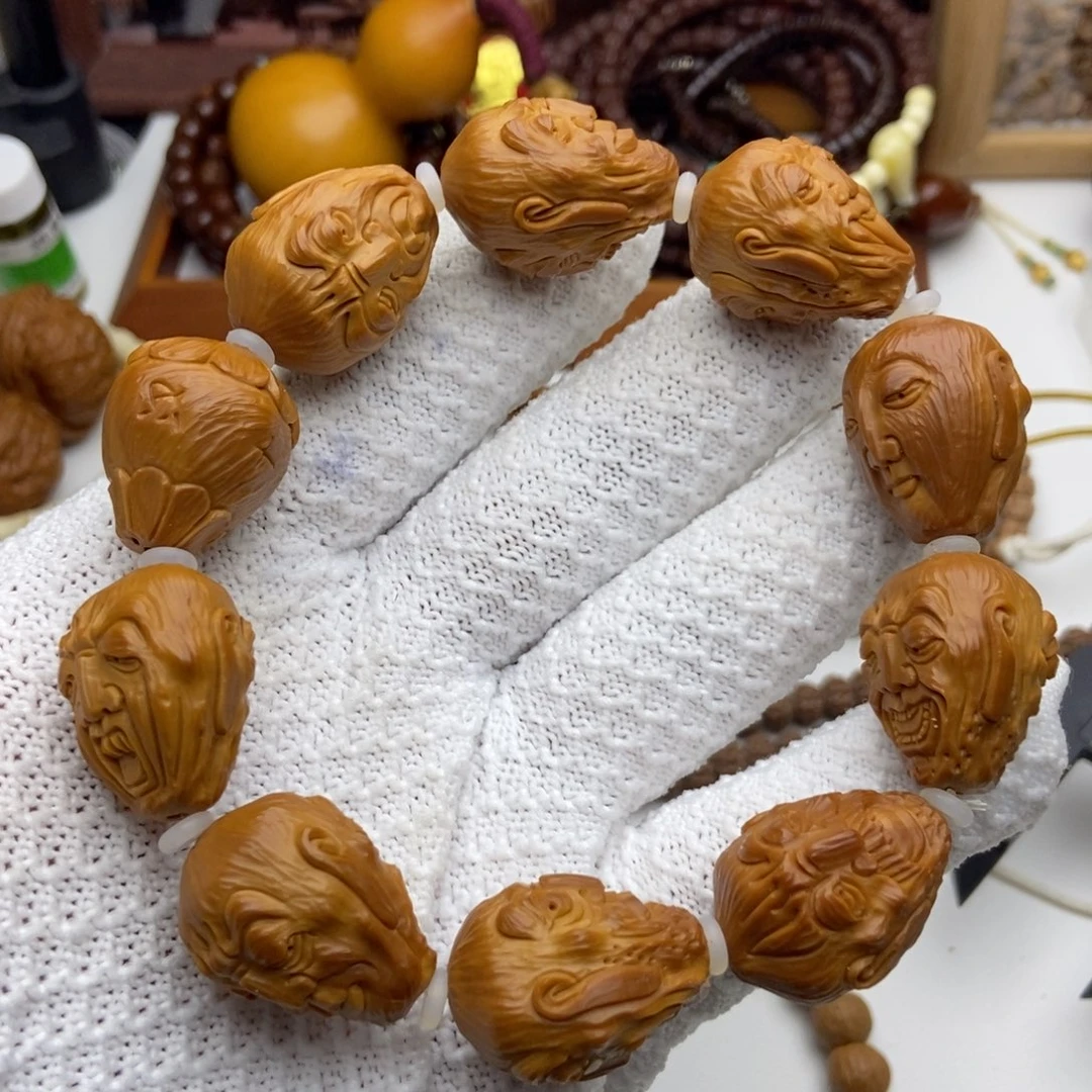 R***i橄榄核吊坠丑罗汉