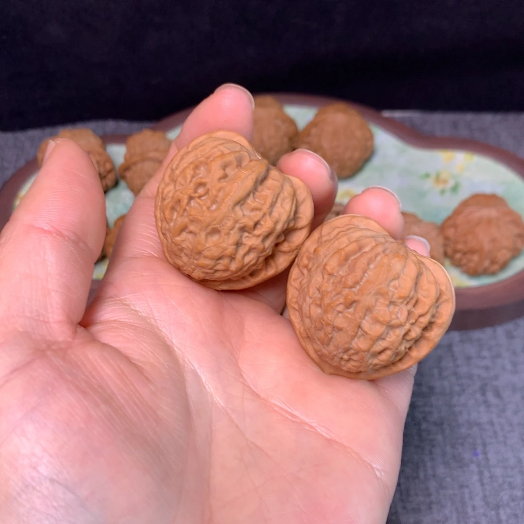 文玩核桃把件40金牛