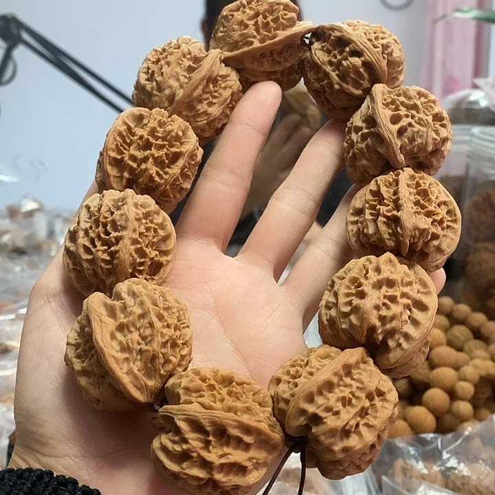 文玩核桃把件38野牛手持