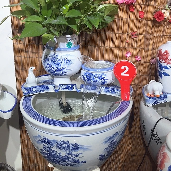 蓟***刘紫砂花盆1米青花流水