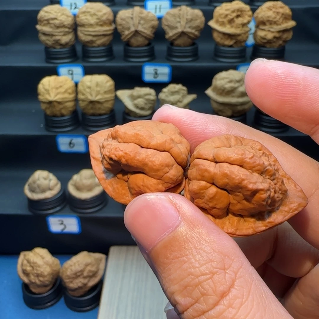 石***驼桃核把件小云石观音