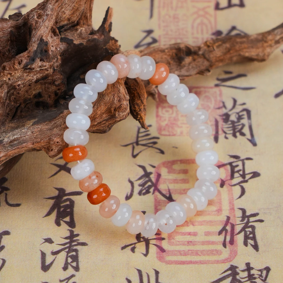 SC-254 天然金丝玉蜜桃算盘珠手串 珠径约8*5mm