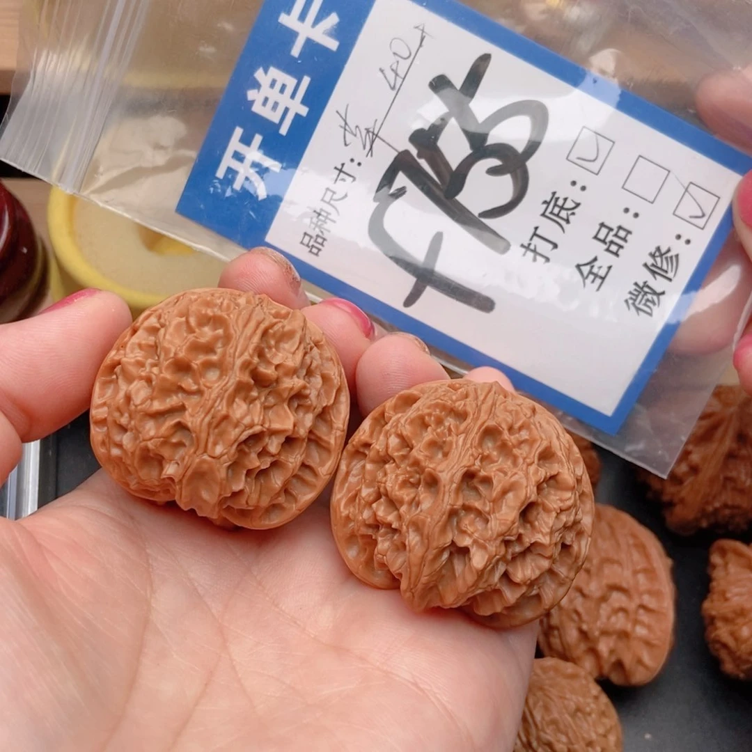 小***、桃核吊坠核桃苹果