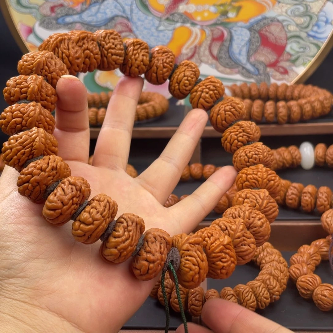 桃核手串龙纹桃核麒麟