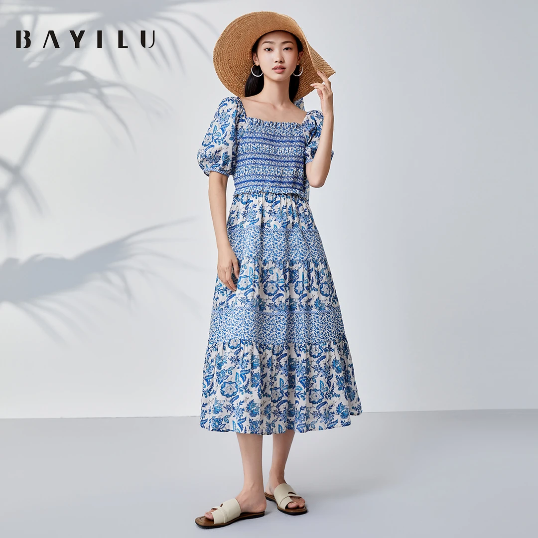 芭依璐夏季连衣裙女碎花泡泡袖度假长裙90L7057