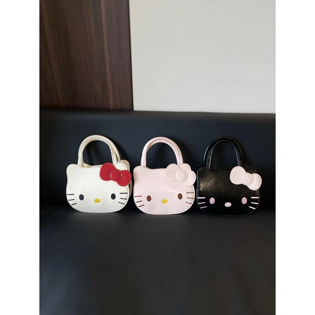 可爱KT猫单肩斜挎手提包 韩系萌趣蝴蝶结精致小众设计通勤包包