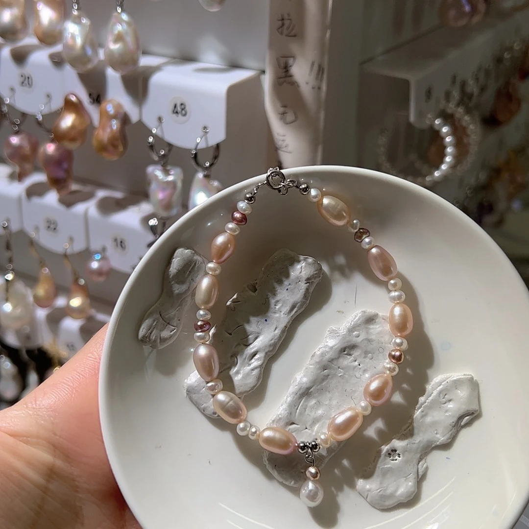 淡水珍珠银S925镶嵌耳饰