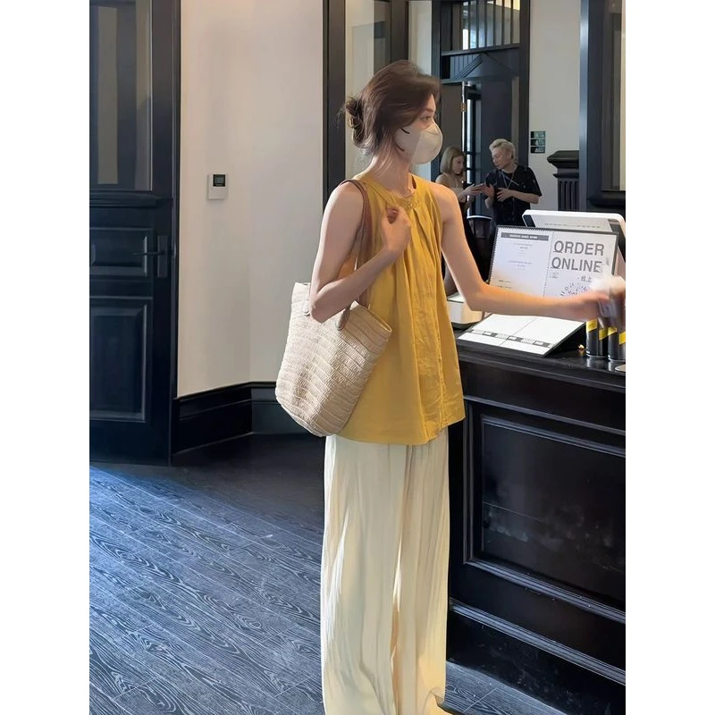 2025夏季新款韩版黄色挂脖吊带小背心上衣设计感高腰显瘦阔腿裤女