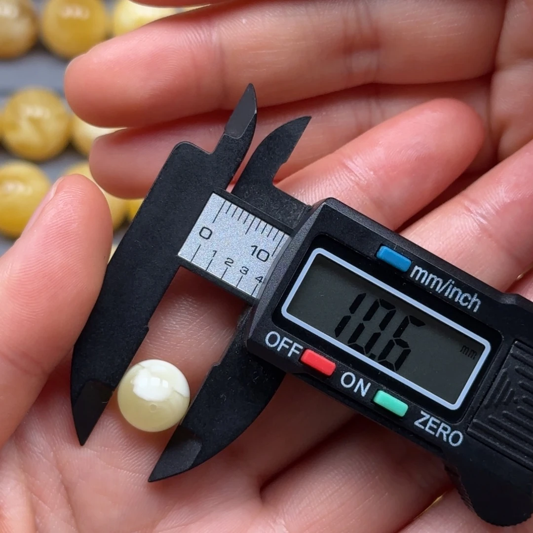 琥珀未镶嵌裸石蜜蜡妖花单珠