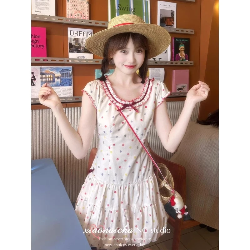 甜美可爱蝴蝶结彩色波点小飞袖连衣裙女2025夏日新款减龄花苞短裙