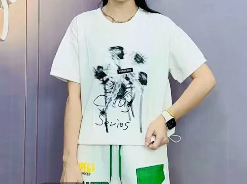 新款A3182白拼蕾丝蝴蝶结印花T恤