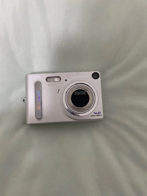 9新 Casio/卡西欧 z4u银色400w像素ccd数码相机